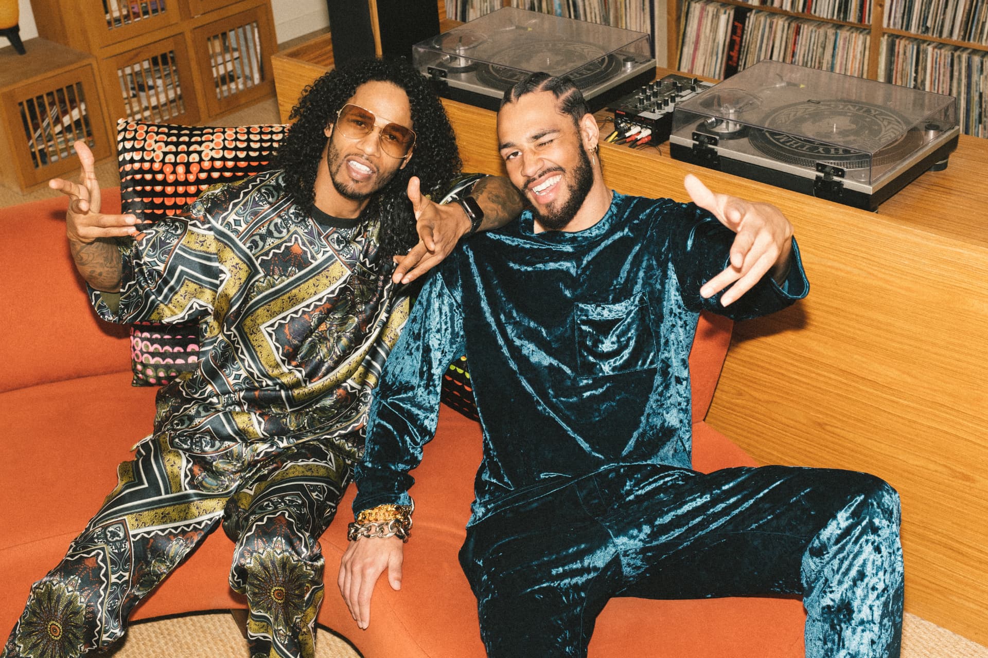 Printed silk and crushed velvet sets photographed in a vinyl listening lounge