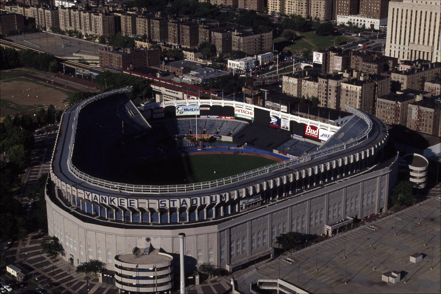 Aerial view of a New York ballpark surrounded by Bronx apartment blocks.