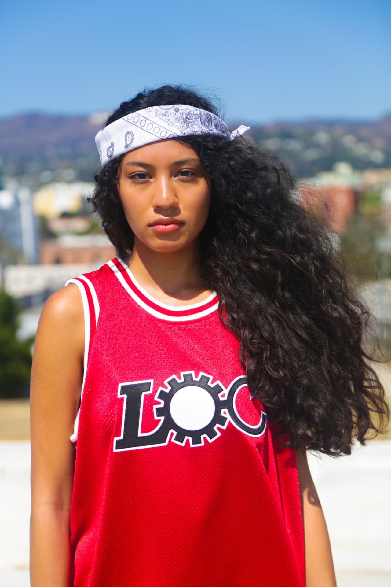 Red mesh jersey portrait with printed bandana